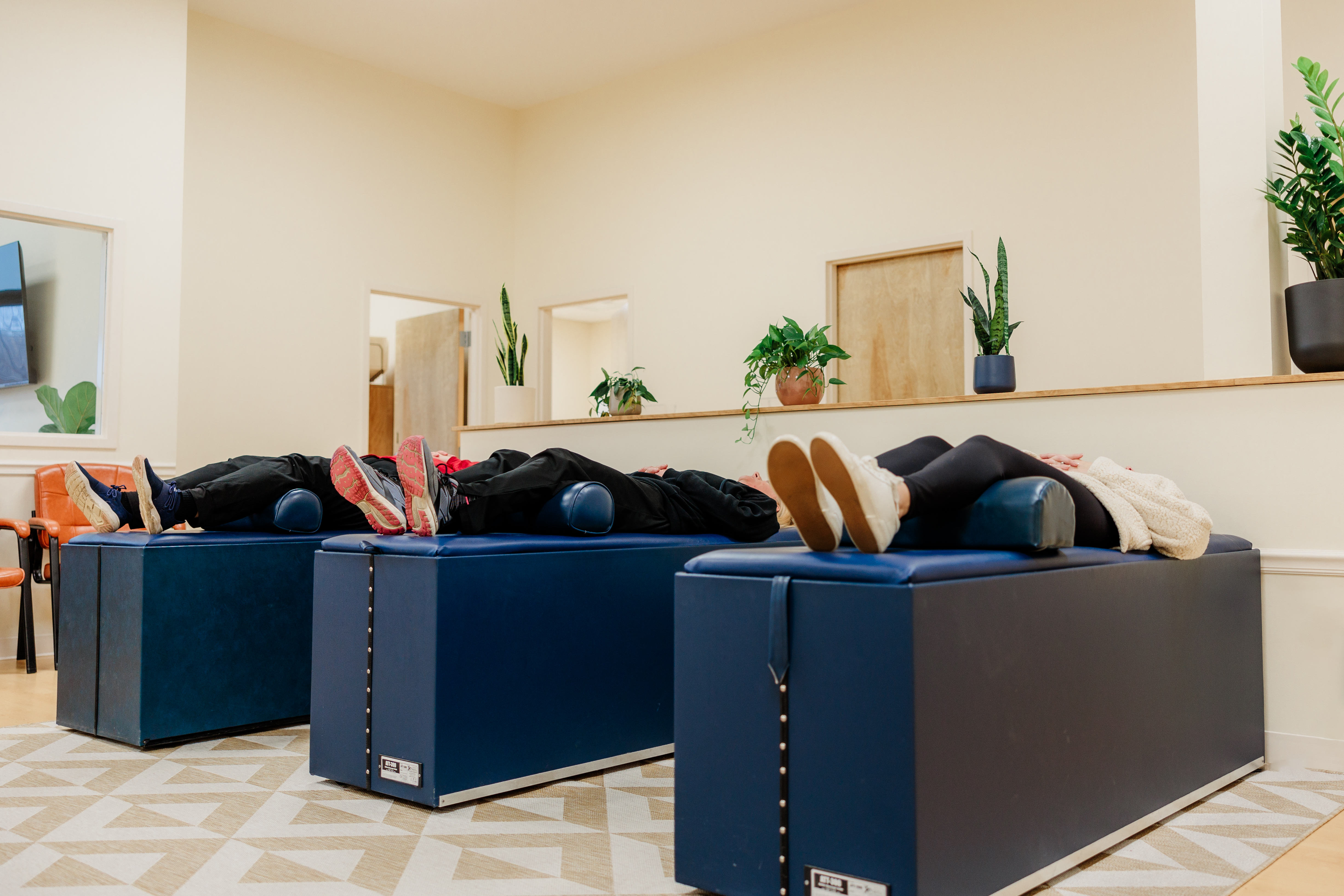 Warm, gentle prenatal adjustment on a specialized chiropractic table