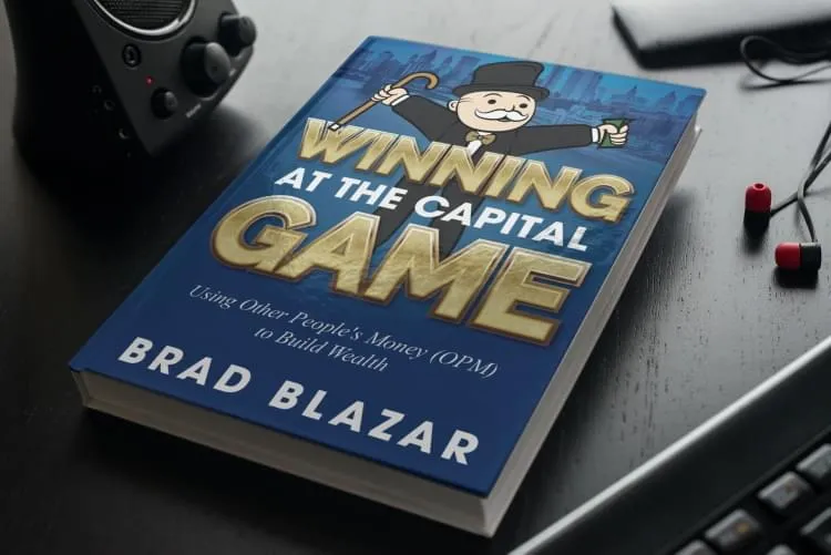 Physical copy of 'Winning At The Capital Game' book