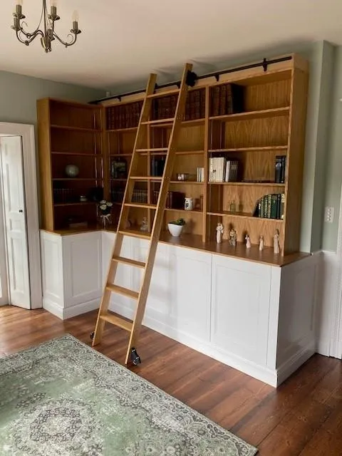 Bspoke crafted hand mde wall unit with access ladder