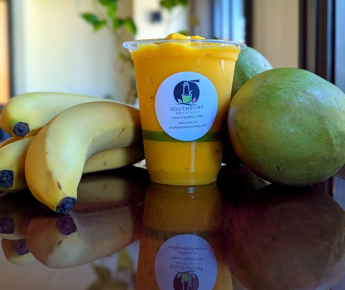 Smoothie made with real, fresh ingredients - mango, banana, and tumeric. dairy free gluten free