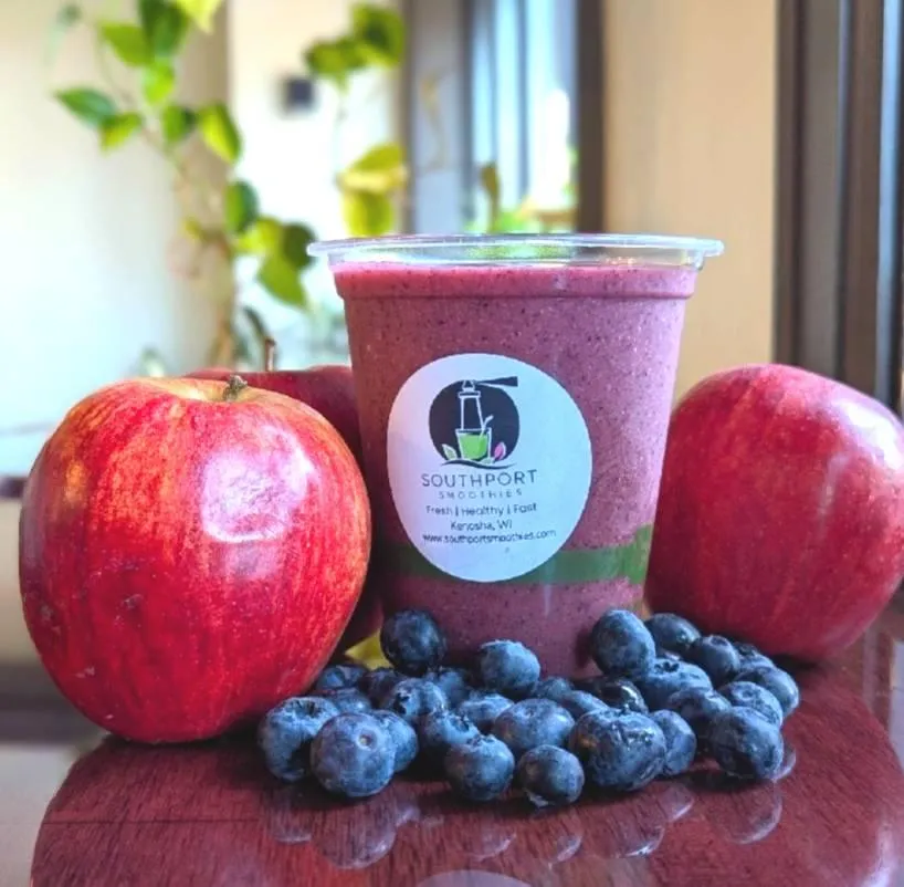 Smoothie made with real, fresh ingredients - strawberries, apples, blueberries, spinach, chia seeds. dairy free gluten free