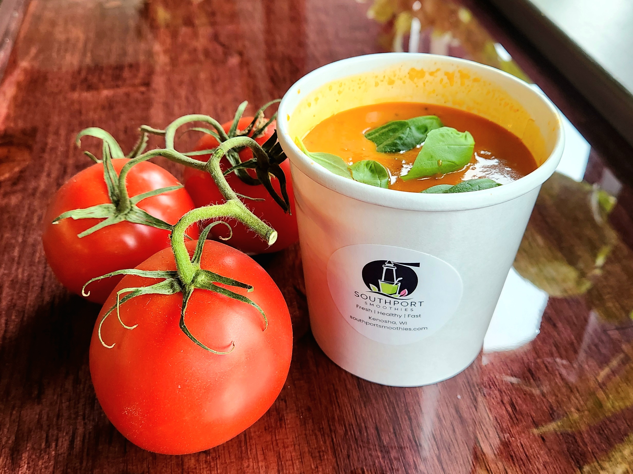 Smoothie made with real, fresh ingredients - mango, pinapple, strawberries, and oranges. dairy free gluten freen