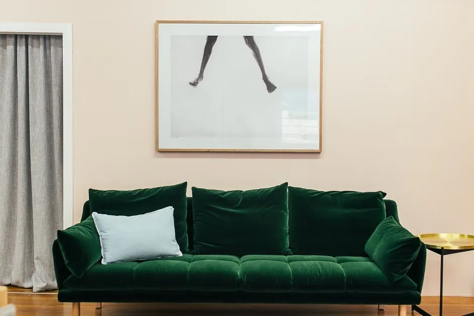 Green sofa in a modern Calgary living room