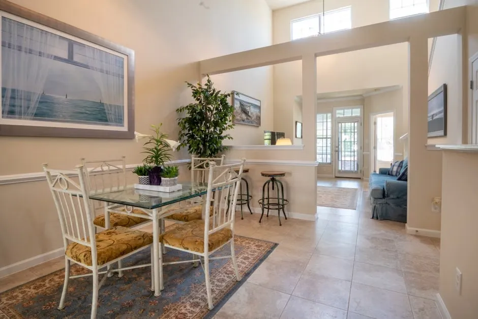 Coordinated living and dining furniture in an open-concept home
