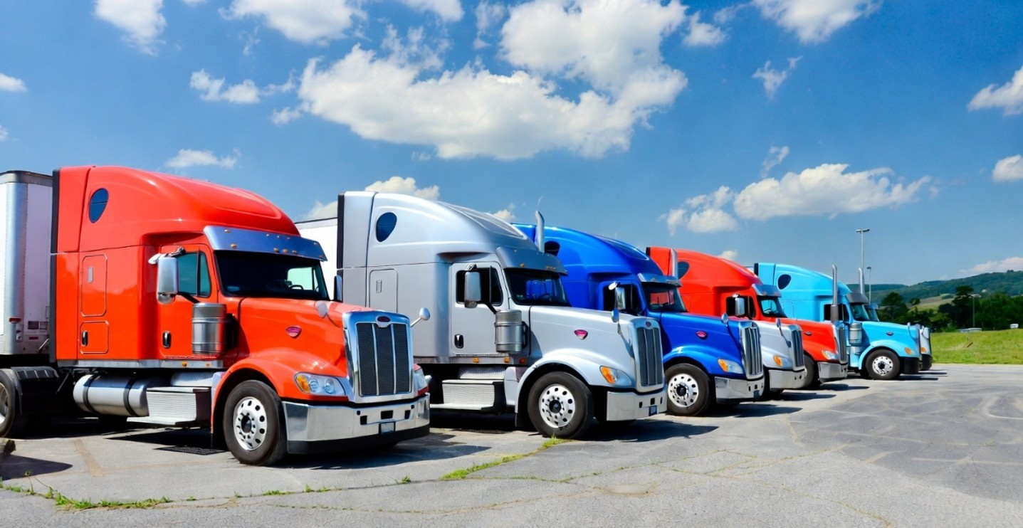 a man riding skis down the side of a snow covered slope