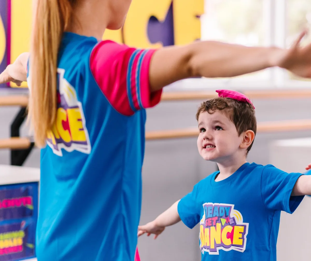 Toddler dancing with a Ready Set Dance teacher at The Tribe Collective in Cardiff, near Newcastle