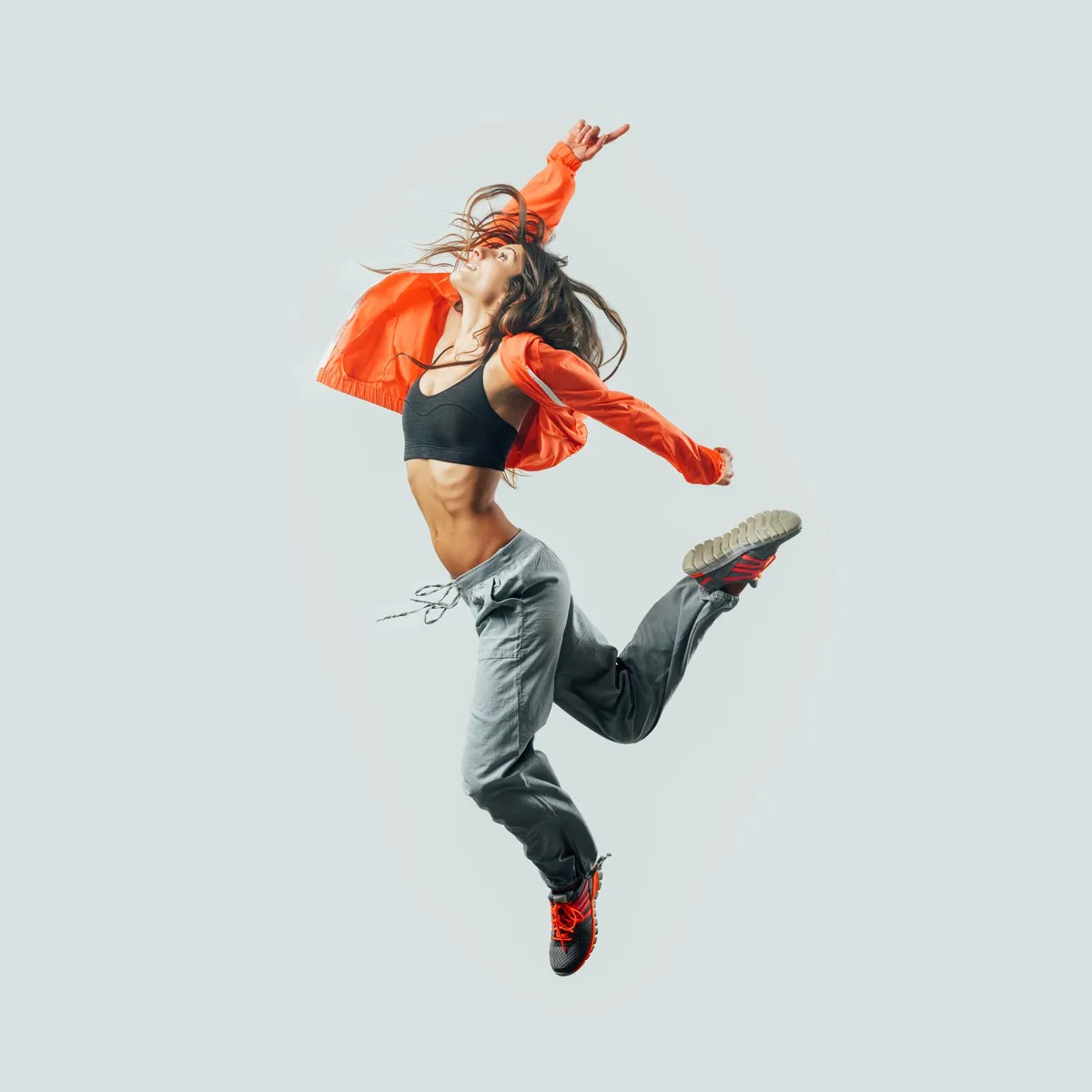 Adult dancer mid-jump in a hip hop class – adult dance classes in Cardiff, Lake Macquarie