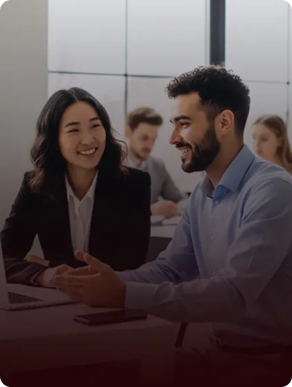 Two professionals discussing business funding options