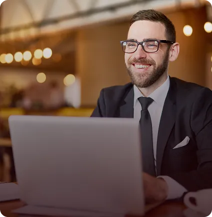 Client working on laptop during a business consultation