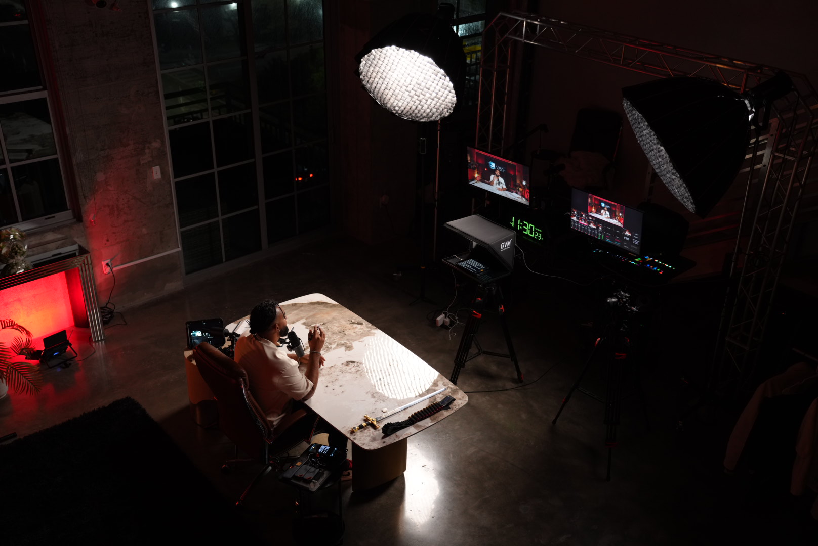 Entrepreneur recording content in a studio