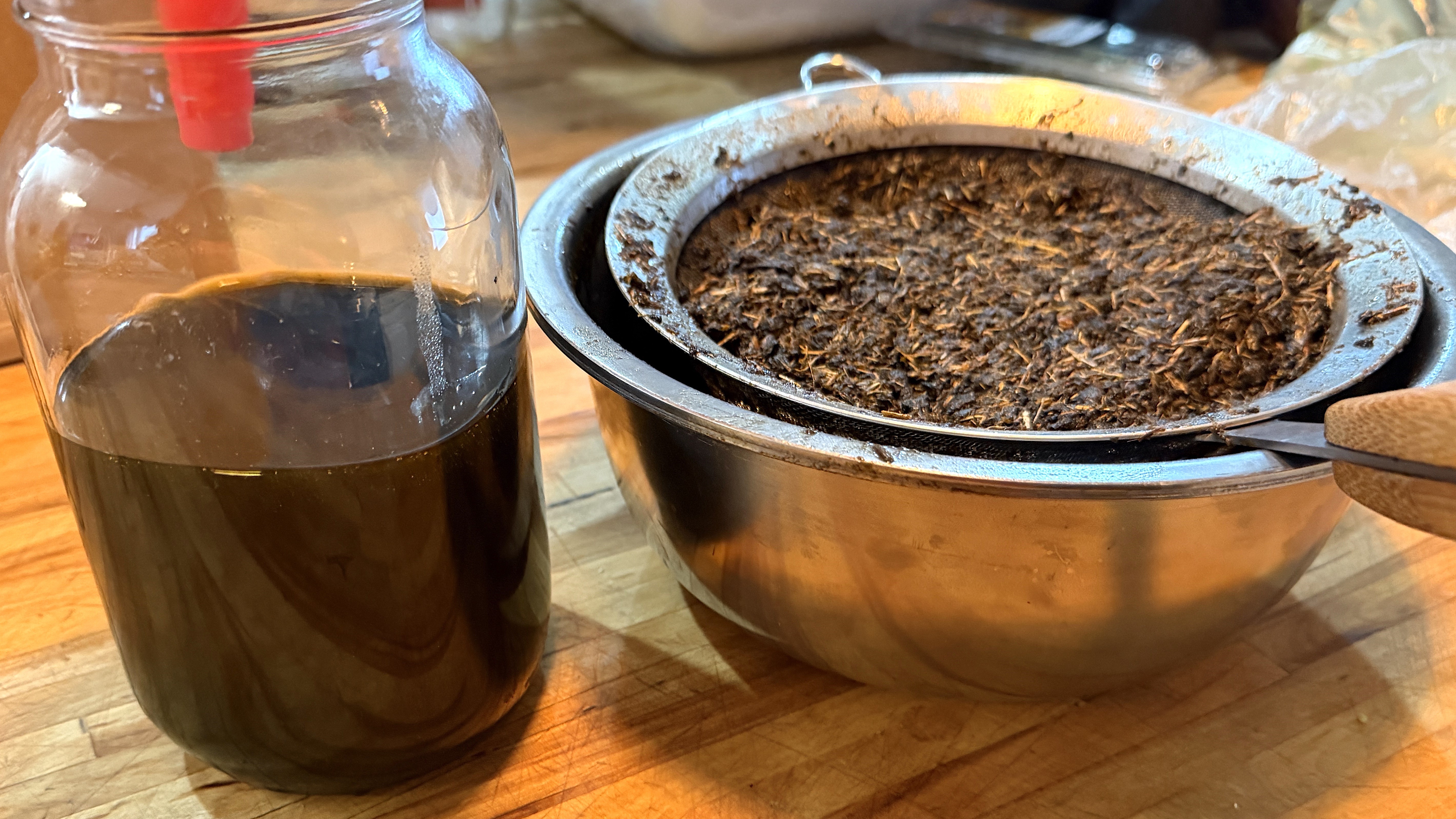 Herbalist preparing formulas for dogs at wooden table