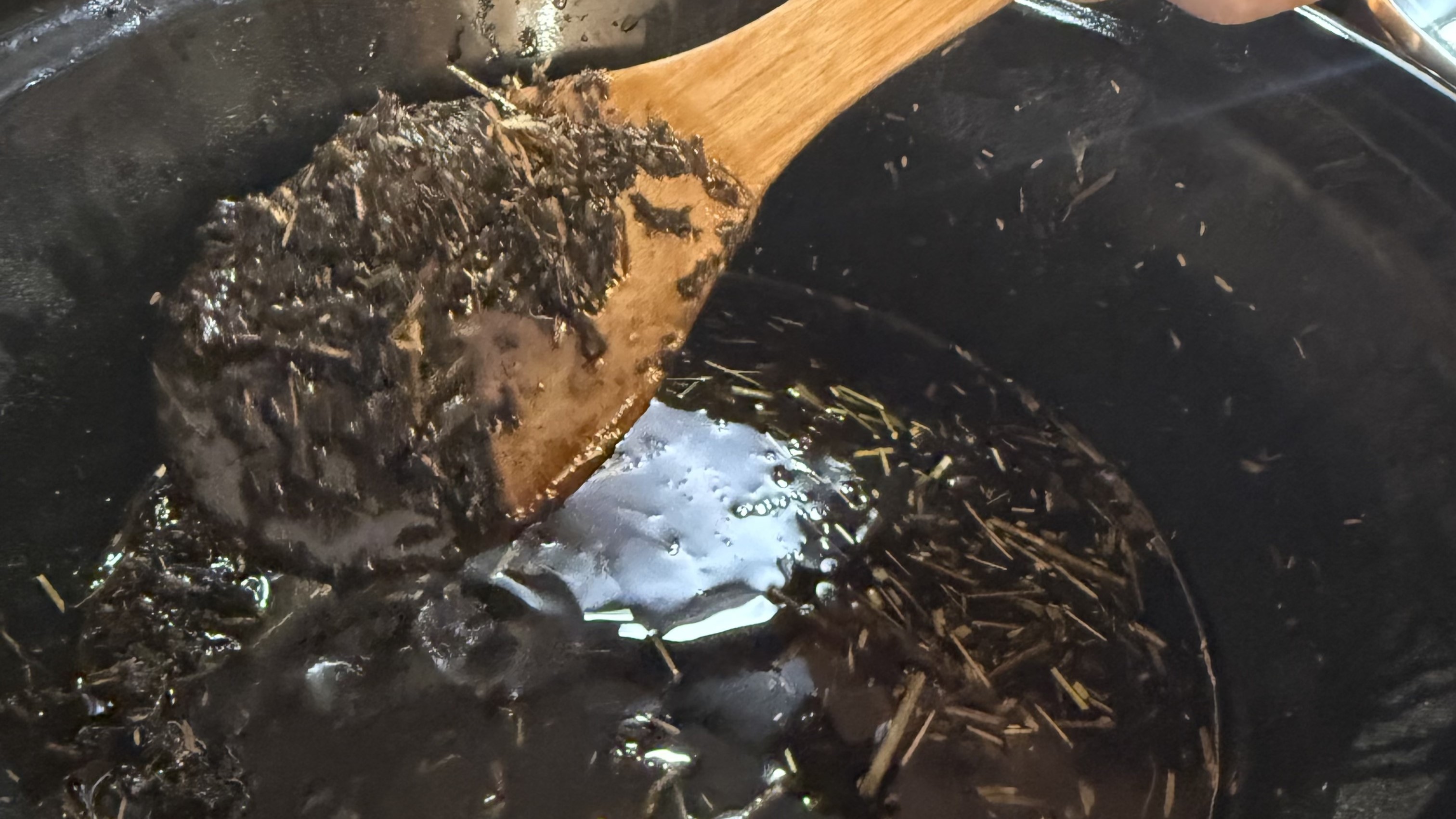Herbalist preparing formulas for dogs at wooden table