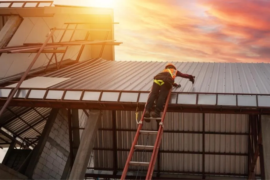 Roof repair and maintenance on a metal roof in Whatcom County for durability