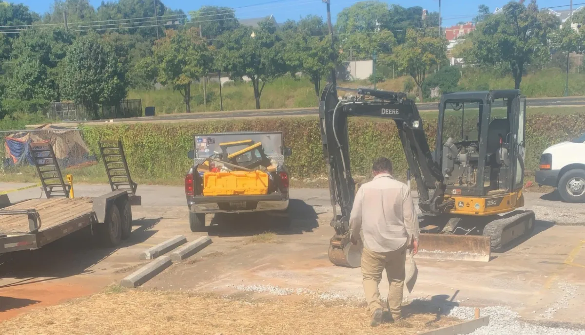 land clearing crew removing debris from lot