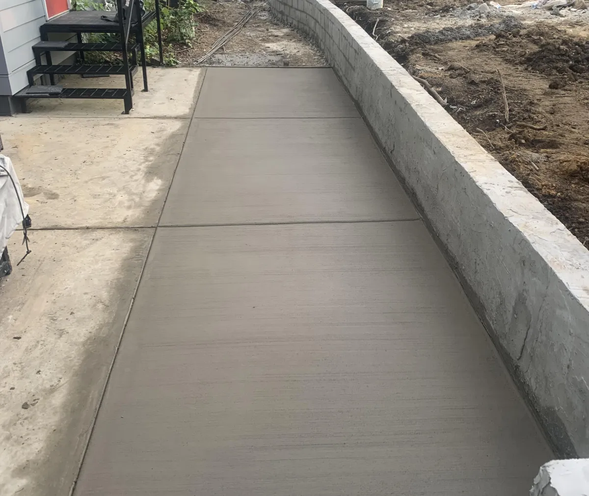 block retaining wall construction on sloped yard