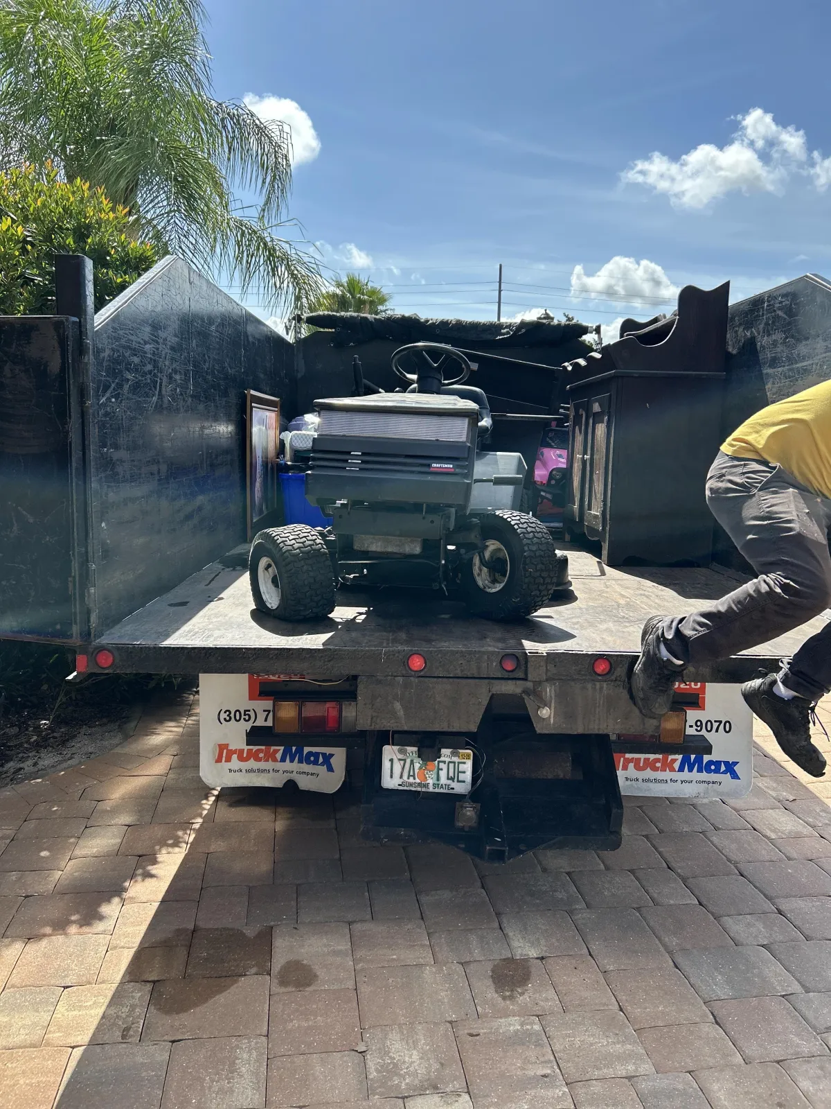 removal of broken-down ride on lawn mower