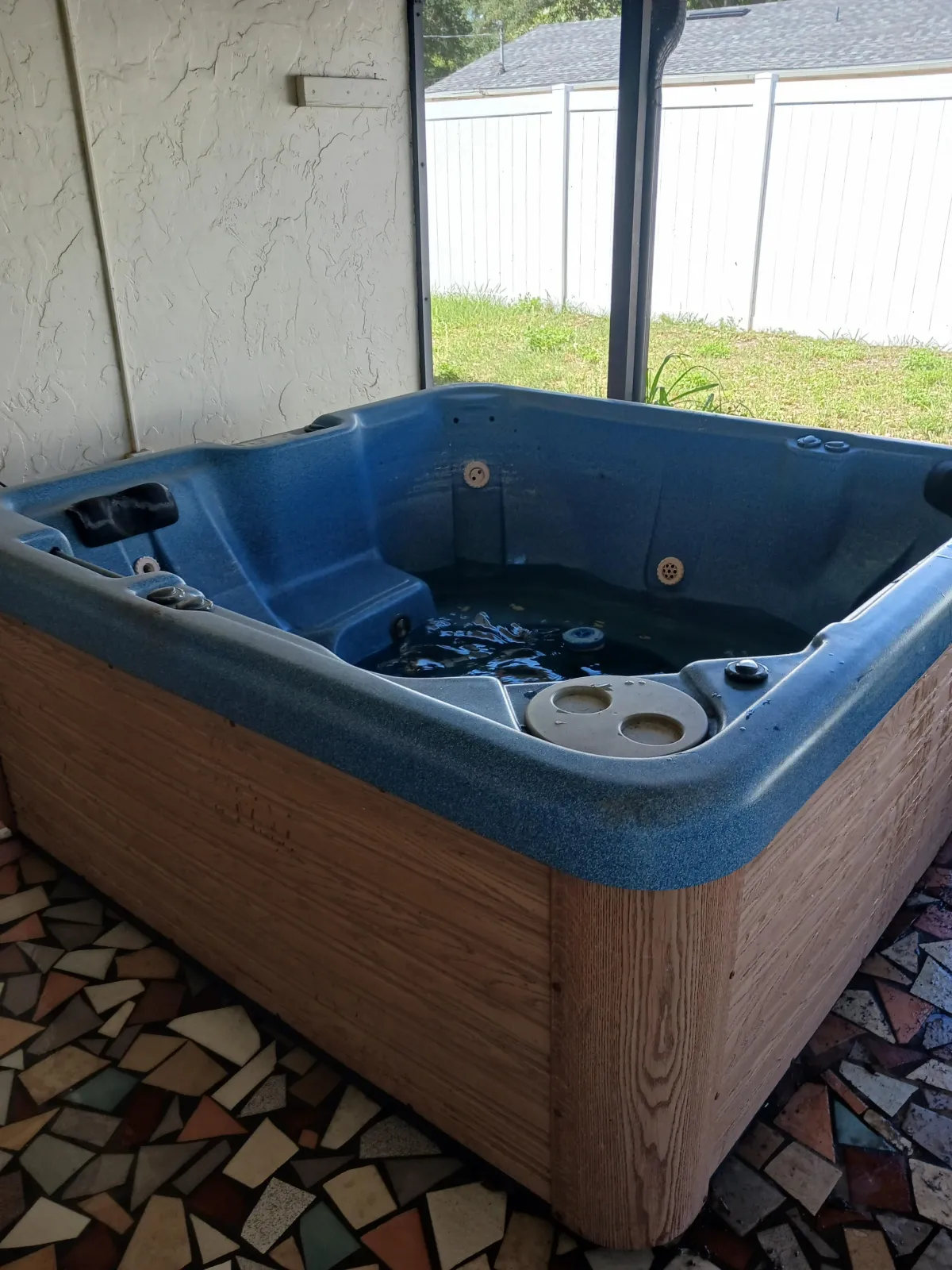 indoor hot tub removal with water