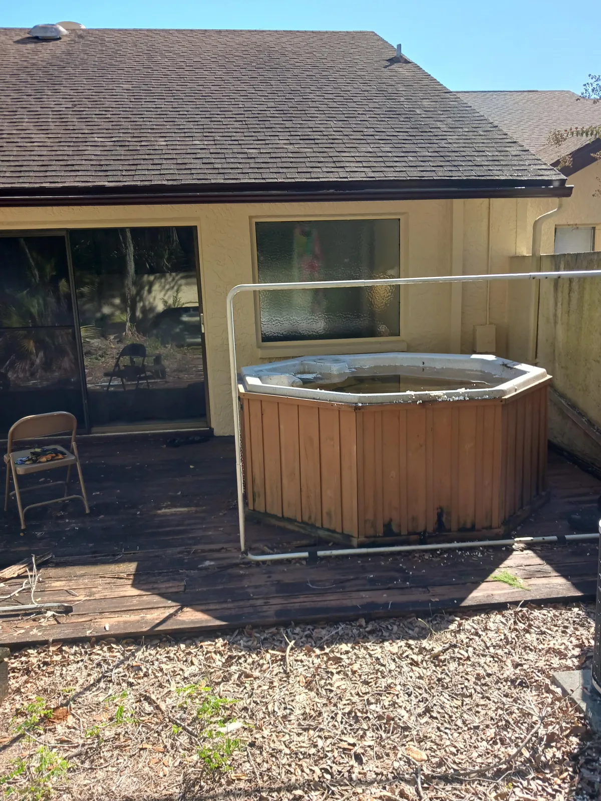 removal of hot tub with water