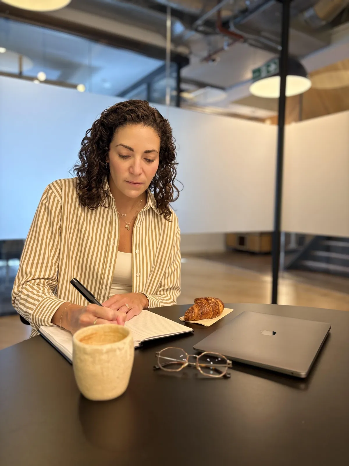 Nikki Fata, virtual nutritionist creating personalized report for clients wanting to eat healthier and optimize their nutrition