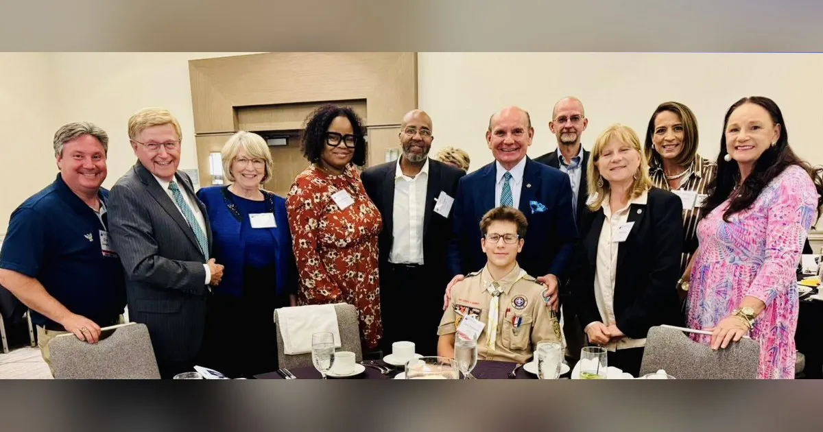 Erik Swenk with guests and Eagle Scout Justin Thompson at the Golden Eagle Dinner