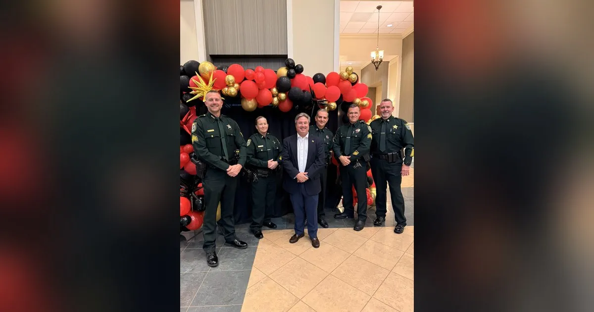 Erik Swenk with Seminole County Sheriff’s Office deputies at the Volunteer Appreciation Dinner