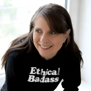 Chris Prebble, LPC, smiling in an Ethical Badass™ hoodie — the counselor behind the Ethical Badass Workshop and Practice Lab for helping professionals.