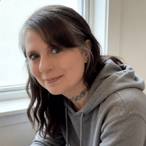 Chris Prebble, Licensed Professional Counselor and therapy intensive specialist, sitting near a window with a warm, direct expression