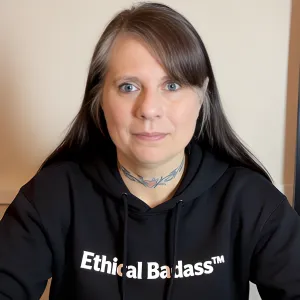Chris Prebble, LPC, smiling in a black Ethical Badass hoodie — the therapist and consultant behind the Ethical Badass™ Workshop.