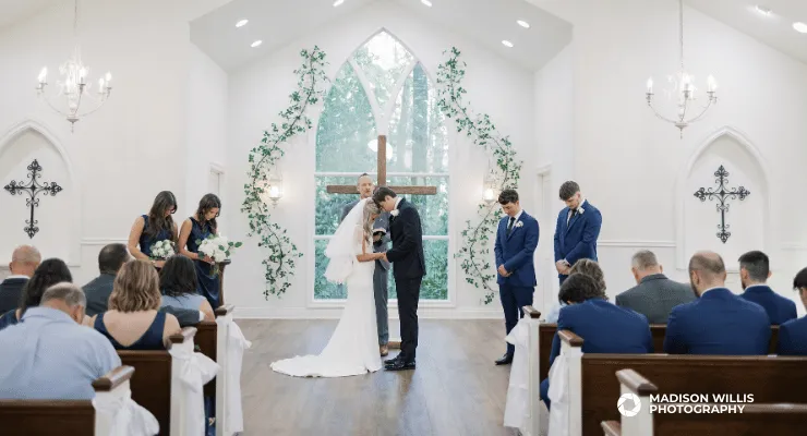 Laney and Ross Cournoyer on their Louisiana wedding day at Bayou Haven in Merryville, LA, captured by Madison Willis Photography.