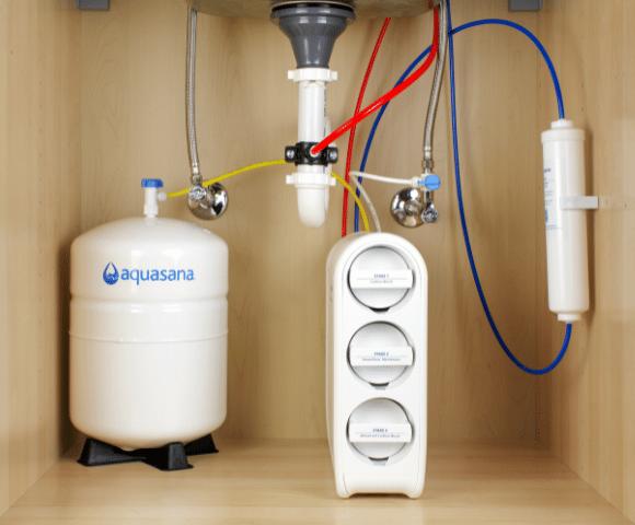 Reverse osmosis drinking water system installed under a kitchen sink