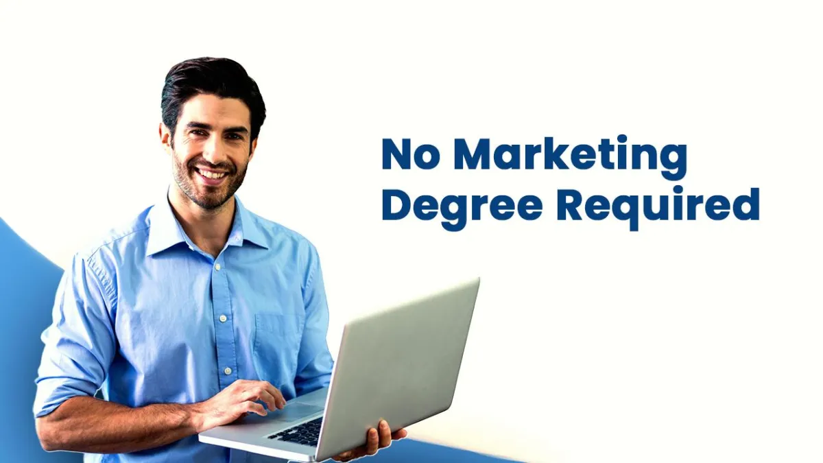 Smiling man holding a laptop beside the text “No Marketing Degree Required.”