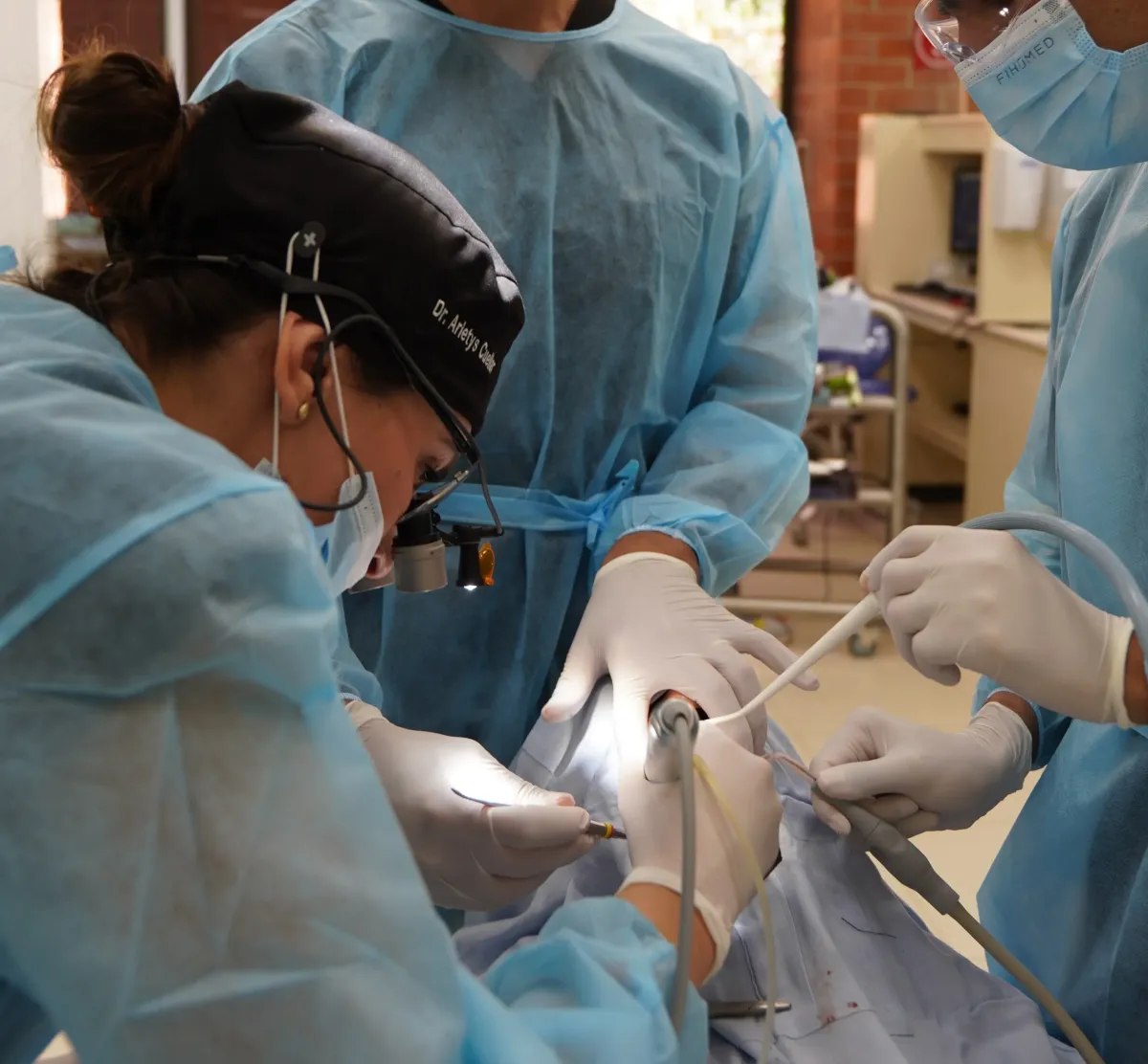 Doctor works on patient