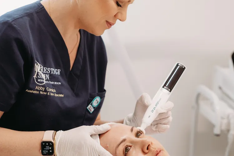 Close-up of a Botox® injection about to be administered to the forehead at Prestige Skin Cambridge