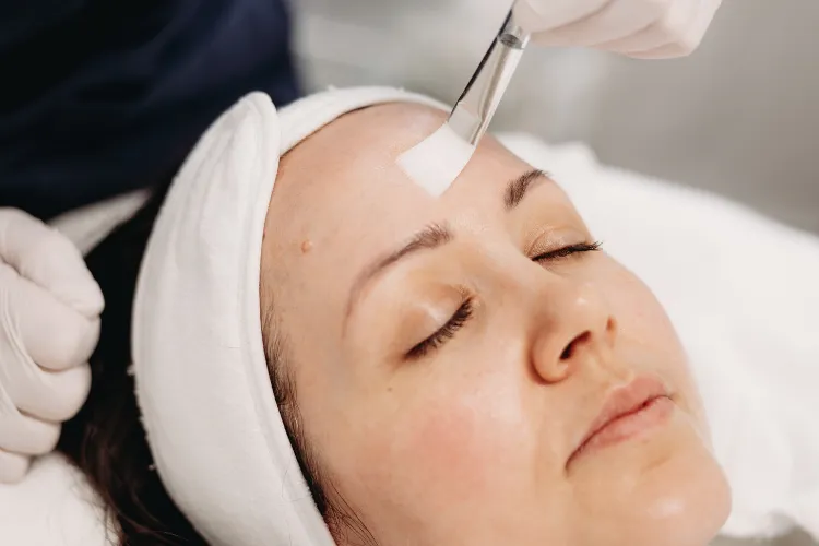 Close-up of a Botox® injection about to be administered to the forehead at Prestige Skin Cambridge