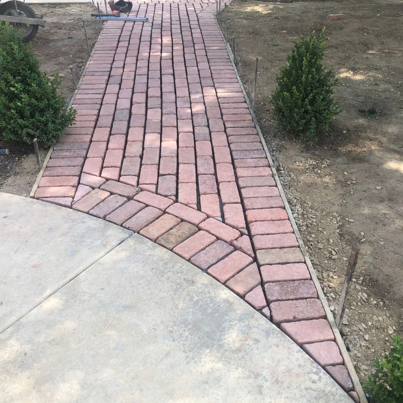 Eco-friendly permeable paver system for stormwater drainage management in Raleigh NC driveway