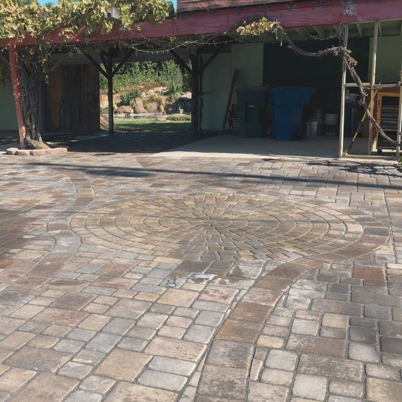 Durable interlocking paver driveway installation replacing concrete at Raleigh residential property