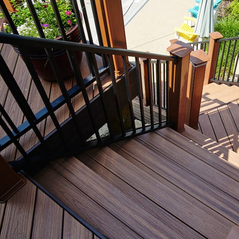 Custom deck railing and stair installation with cable rail system in Wake County home