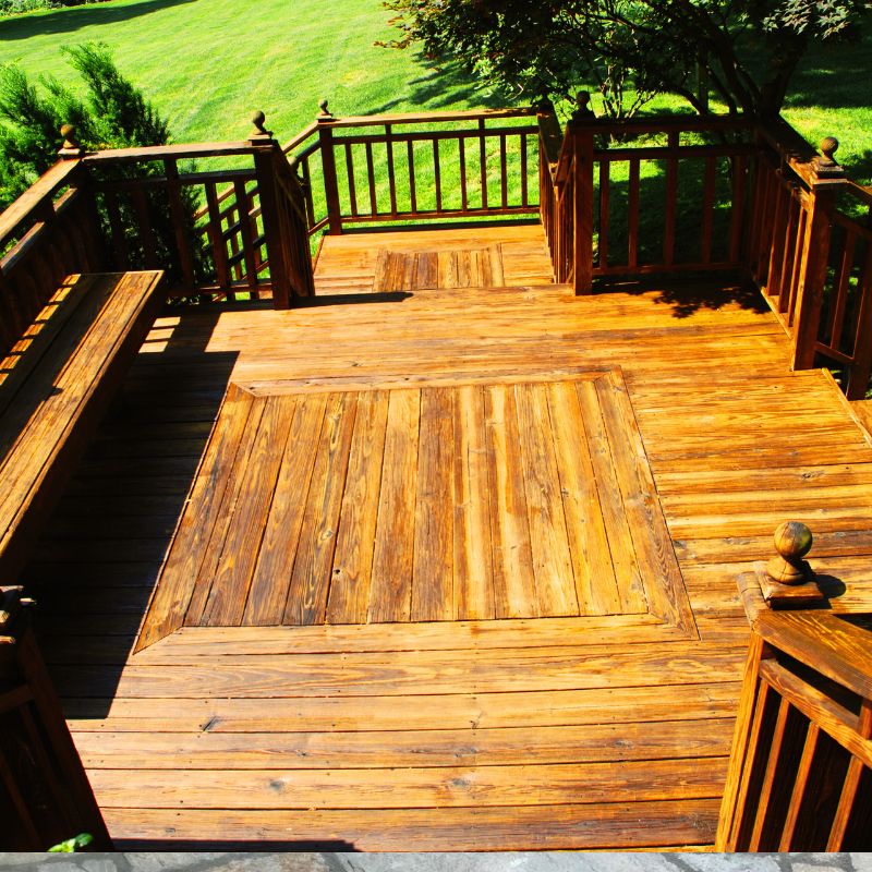 Complex multi-level deck design navigating elevation changes at Wake County residence