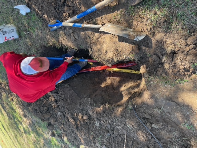 Technician performing gas pipe installation