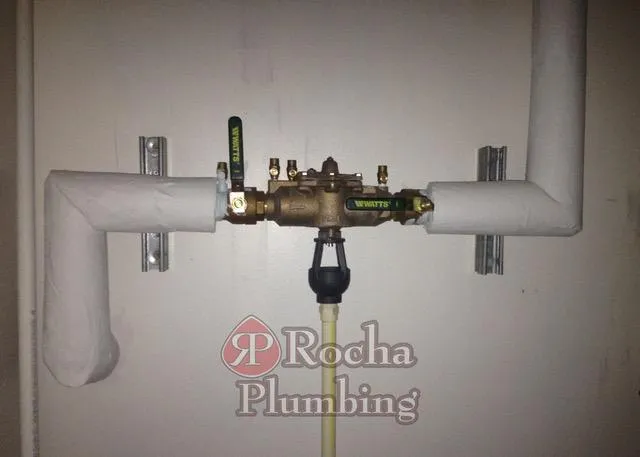 Backflow prevention device installation for residential plumbing