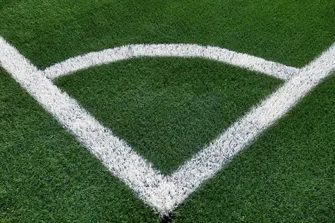 Artificial turf installation with white field line striping by Sunnyvale Landscaping Pro