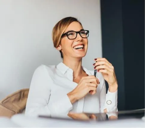 Woman Smiling Looking at Accurate Square Footage Data