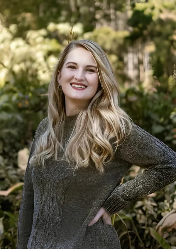 Woman experiencing a glowing, peaceful self-care moment