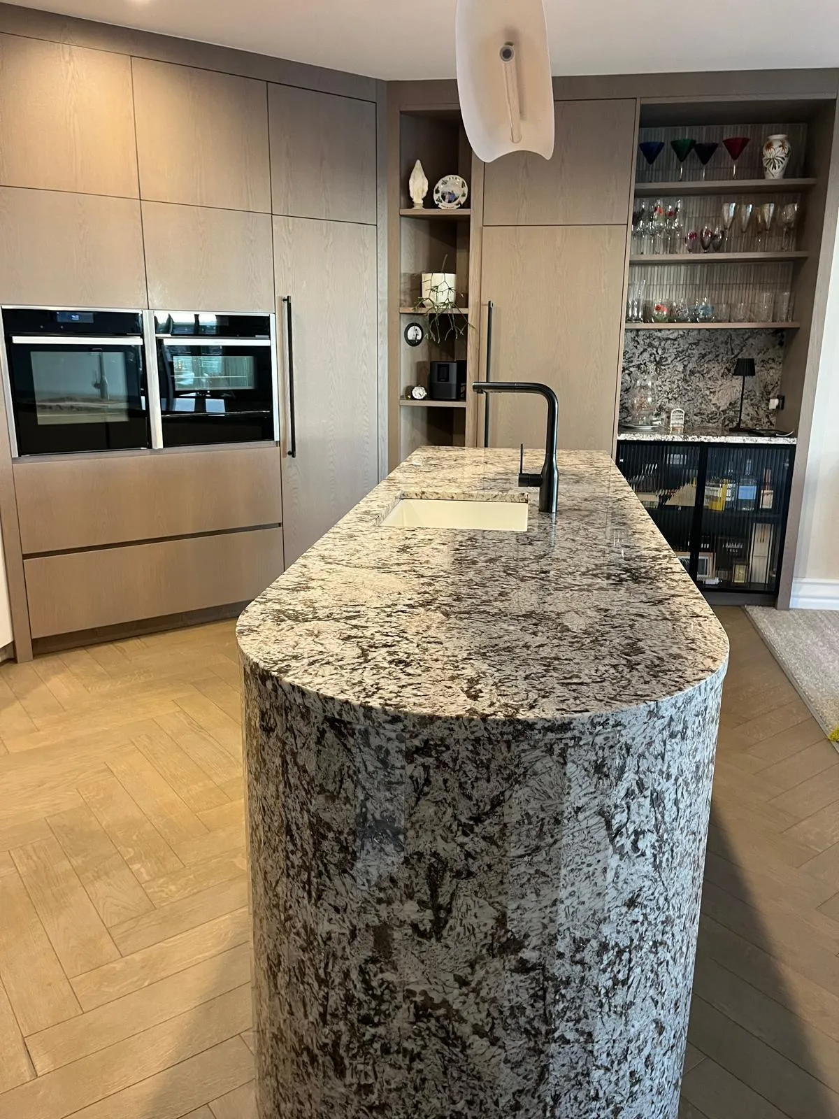 Professional cleaner using eco-friendly products in Auckland office
