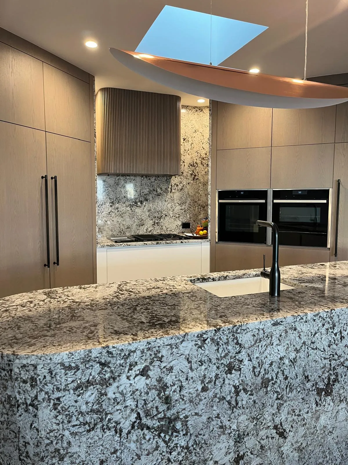 Trust Cleaning Services team cleaning a modern Auckland home