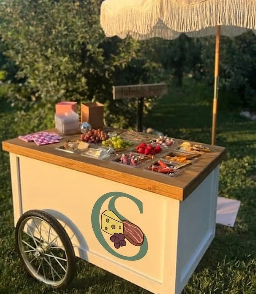 Charcuterie spread prepared by artisanal business owner