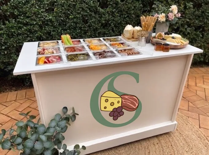 Charcuterie spread prepared by artisanal business owner