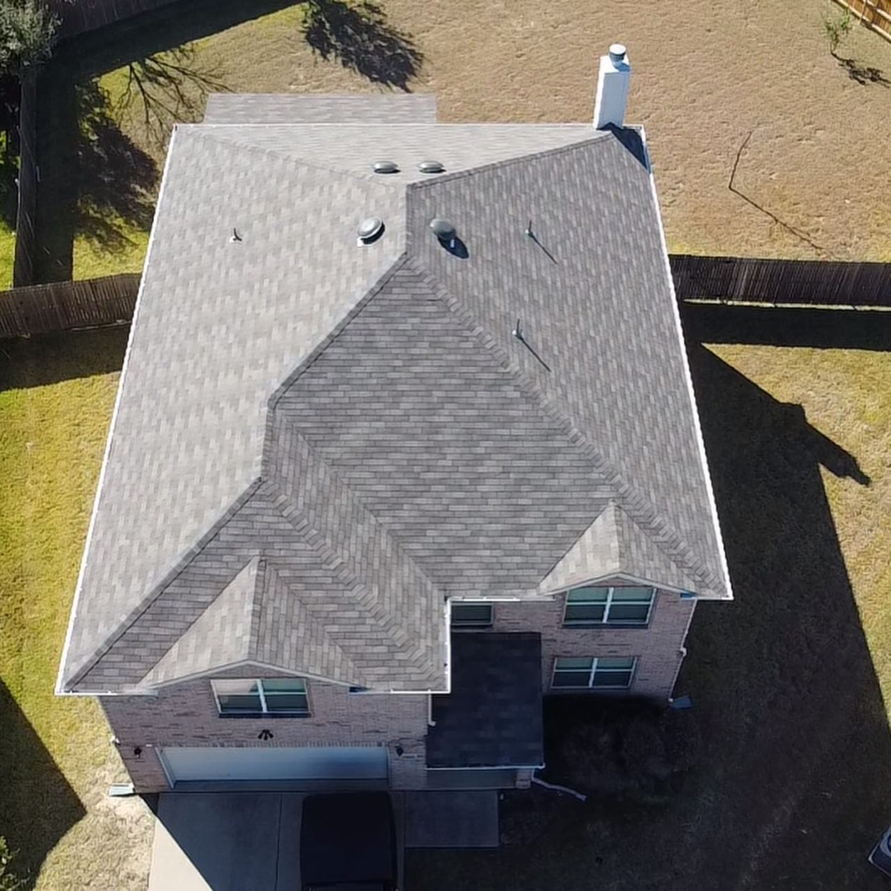 a roof with a few shingles
