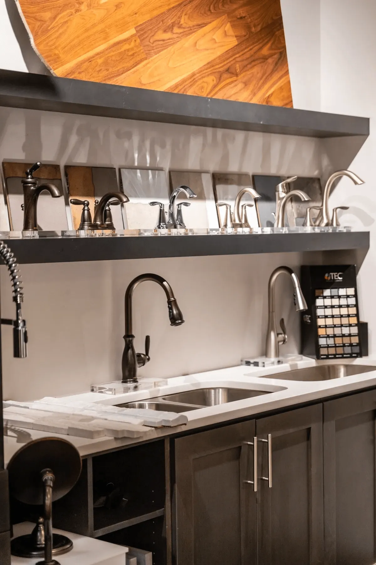 a sink and faucet on a shelf