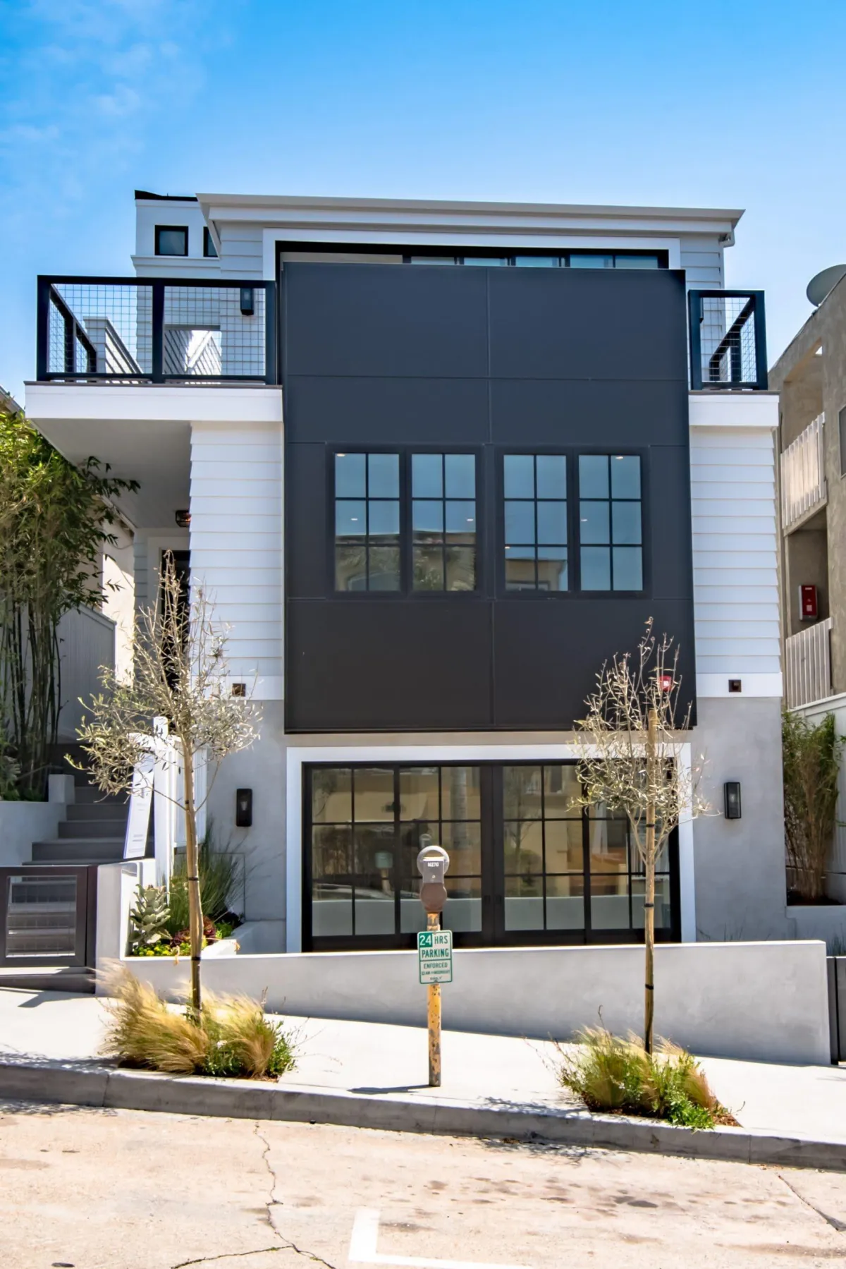 a custom new house build with white siding